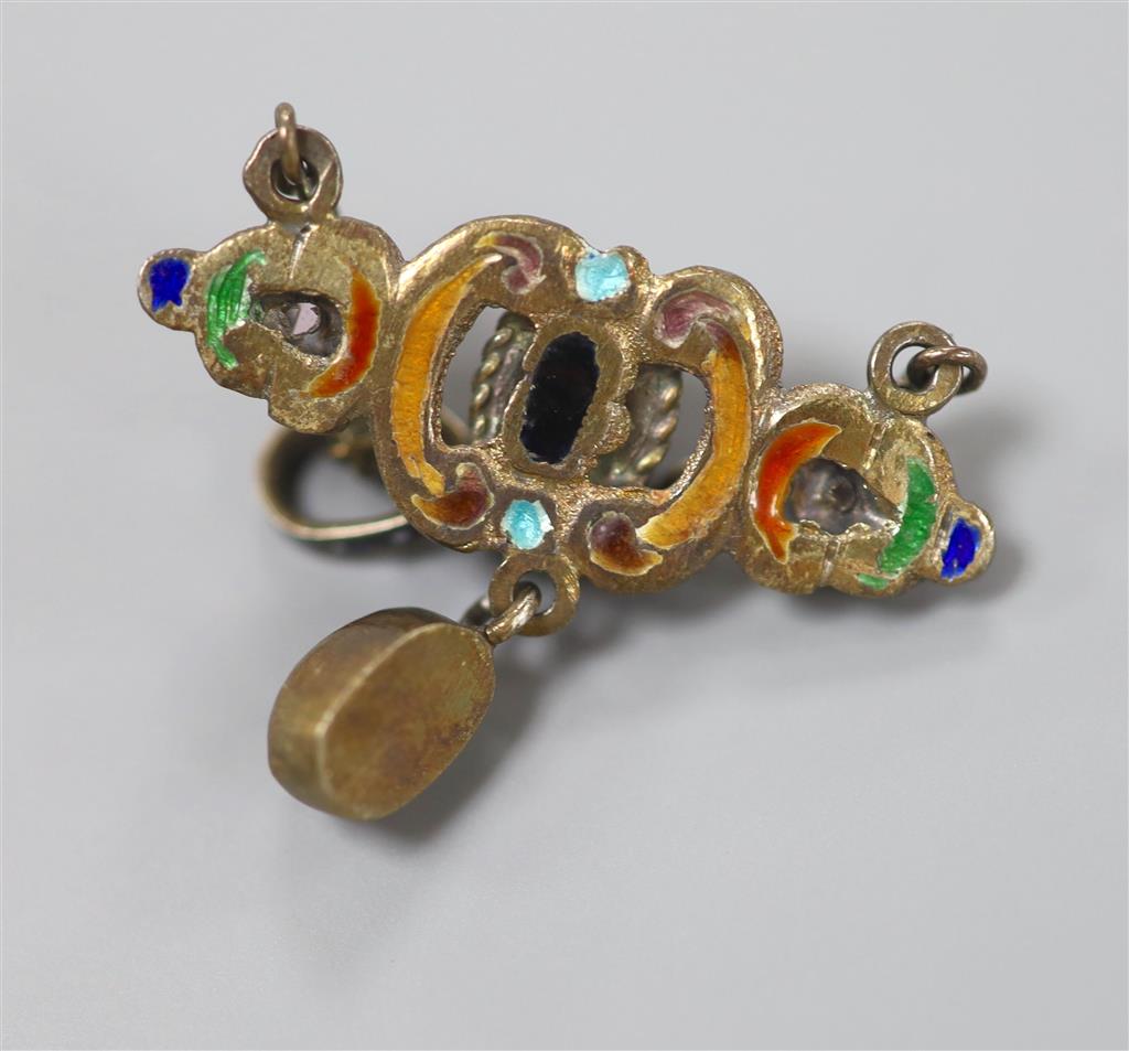 A late 19th century Austro-Hungarian white metal, cabochon garnet, gem and enamel set drop pendant, diameter 32mm.